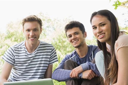 Male female students smiling